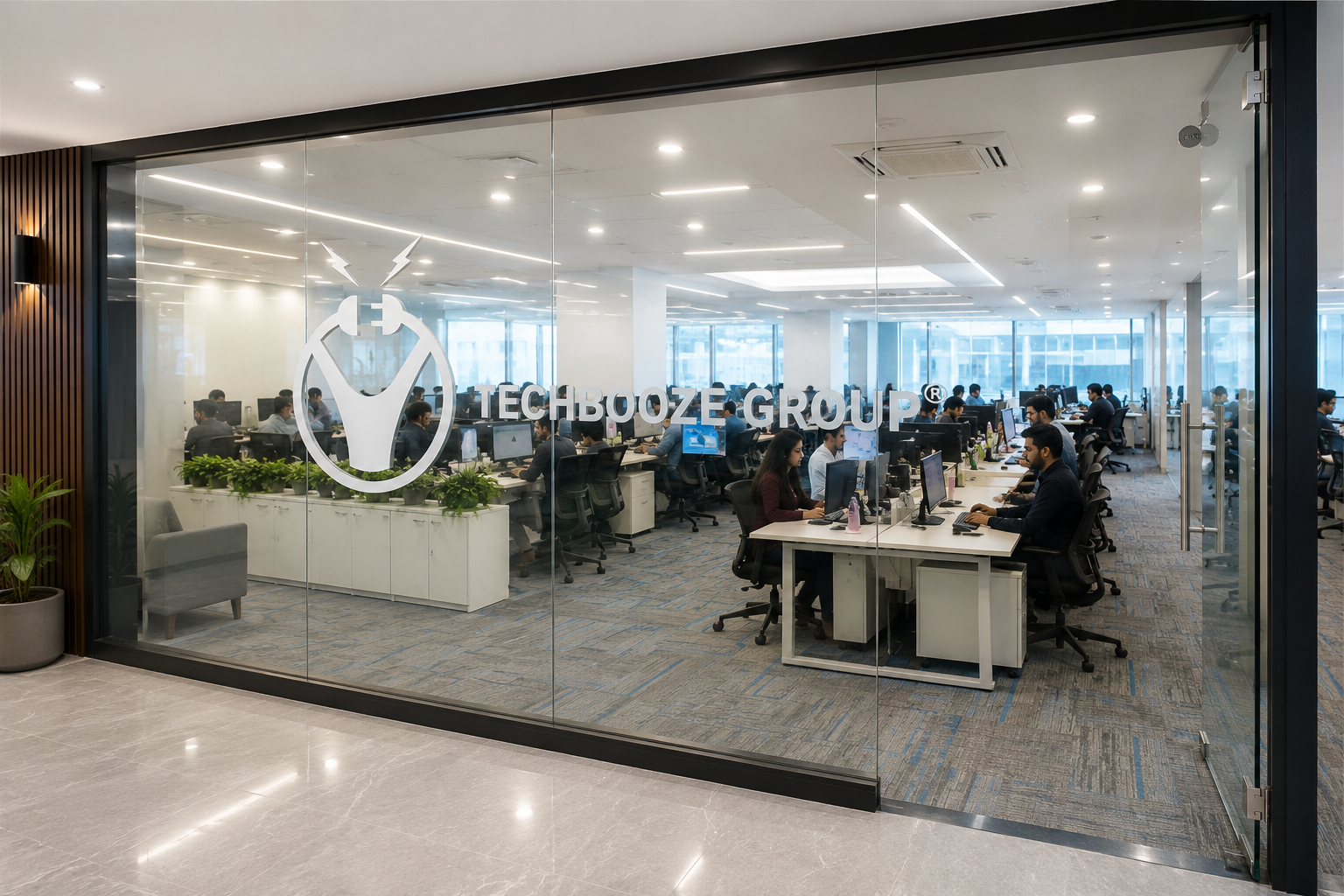 Techbooze Group glass cabin office — modern enterprise workspace representing the group's global presence
